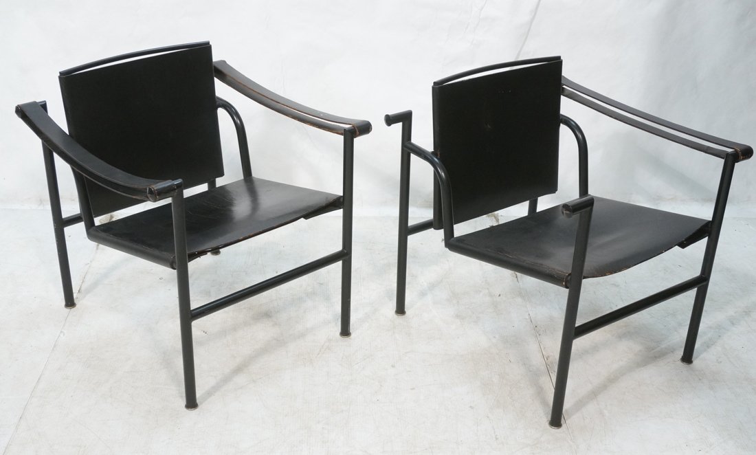 Pr Black metal tube frame lounge chairs. Manner o: Pr Black metal tube frame lounge chairs. Manner of Le CORBUSIER LC1 Sling Chair. Black leather-- Dimensions: H: 26 inches: W: 24 inches: D: 24.5 inches ---