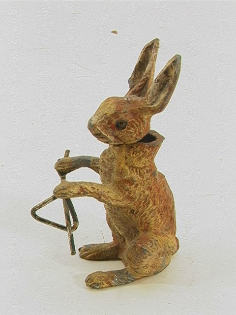 white metal rabbit nodder with dinner bell Vintage: white metal rabbit nodder with dinner bell Vintage Paint decorated Dimensions: H: 3 inches Condition: Head bobs freely. Some paint loss to nose, head and ears US Shipping charge: $6