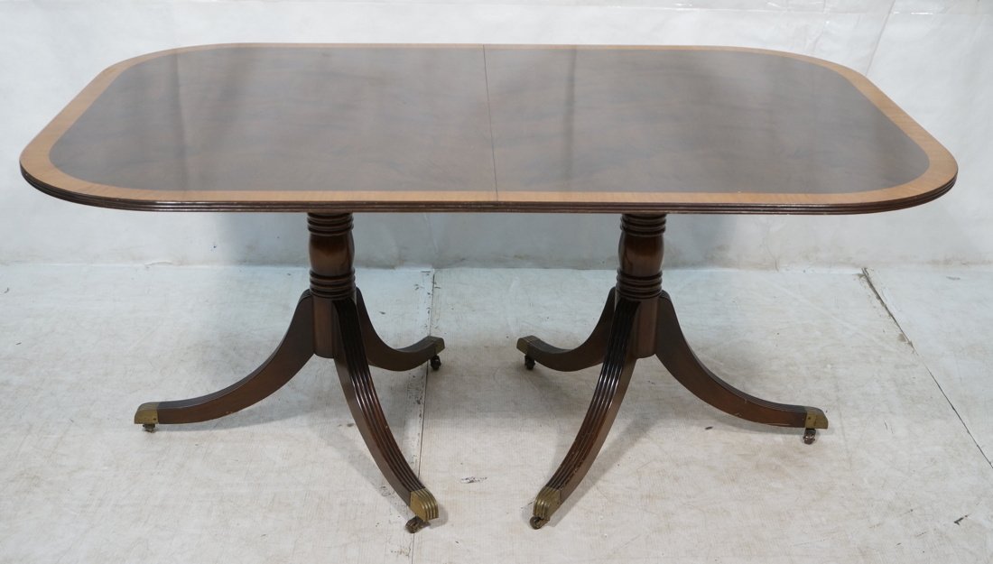 Banded Mahogany Dining table with 2 leaves and Du: Banded Mahogany Dining table with 2 leaves and Duncan Phyfe Legs.-- Dimensions: H: 29 inches: W: 44 inches: D: 65 inches ---