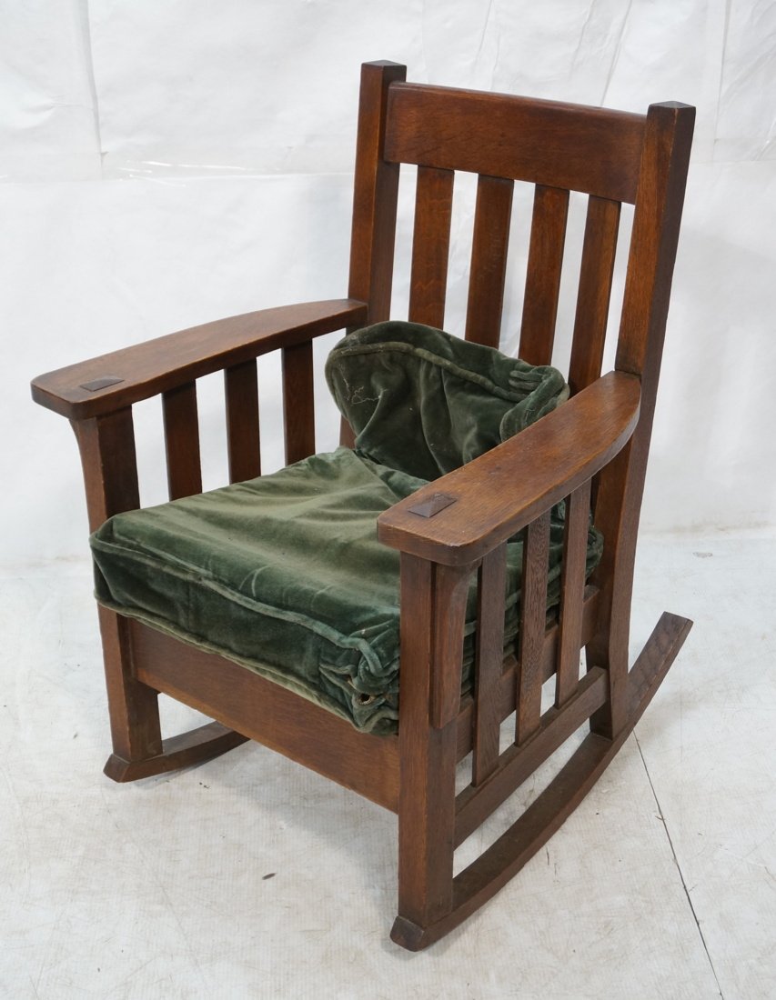 Mission Oak Rocking Chair. Vertical Slat Remnants: Mission Oak Rocking Chair. Vertical Slat Remnants of label -- Dimensions: H: 39 inches: W: 29 inches: D: 30 inches ---