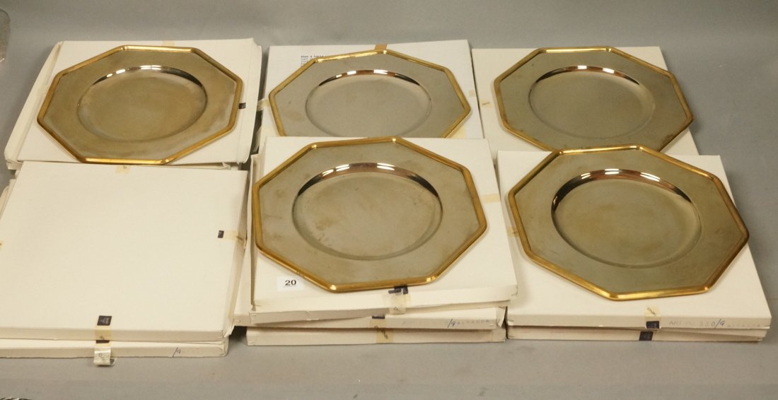 Lot 12 BERNARDAUD LIMOGES Brass & Chrome Chargers: Lot 12 BERNARDAUD LIMOGES Brass & Chrome Chargers. Octagon shape with brass rim. 11 with boxes. Stamped-- Dimensions: H: 11.5 inches: W: 11.5 inches --- US Shipping charge: $50