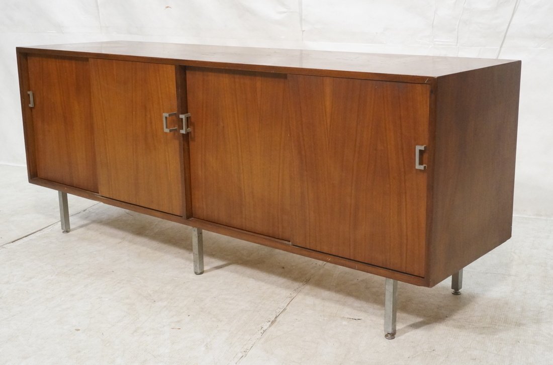Modernist Credenza Sideboard. On legs. Metal pill: Modernist Credenza Sideboard. On legs. Metal pills on double slider doors. -- Dimensions: H: 29.5 inches: W: 72 inches: D: 20 inches ---