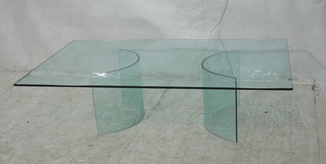70's Modern Glass Top Coffee Cocktail Table. Two: 70's Modern Glass Top Coffee Cocktail Table. Two part glass base.-- Dimensions: H: 15.75 inches: W: 60 inches: D: 36 inches ---