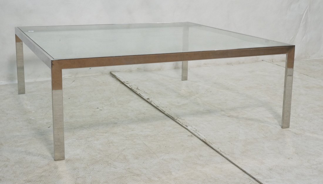 Heavy Modernist Coffee Table. Flat chrome frame c: Heavy Modernist Coffee Table. Flat chrome frame cocktail table with square inset glass.-- Dimensions: H: 15.75 inches: W: 42.25 inches: D: 42.25 inches ---