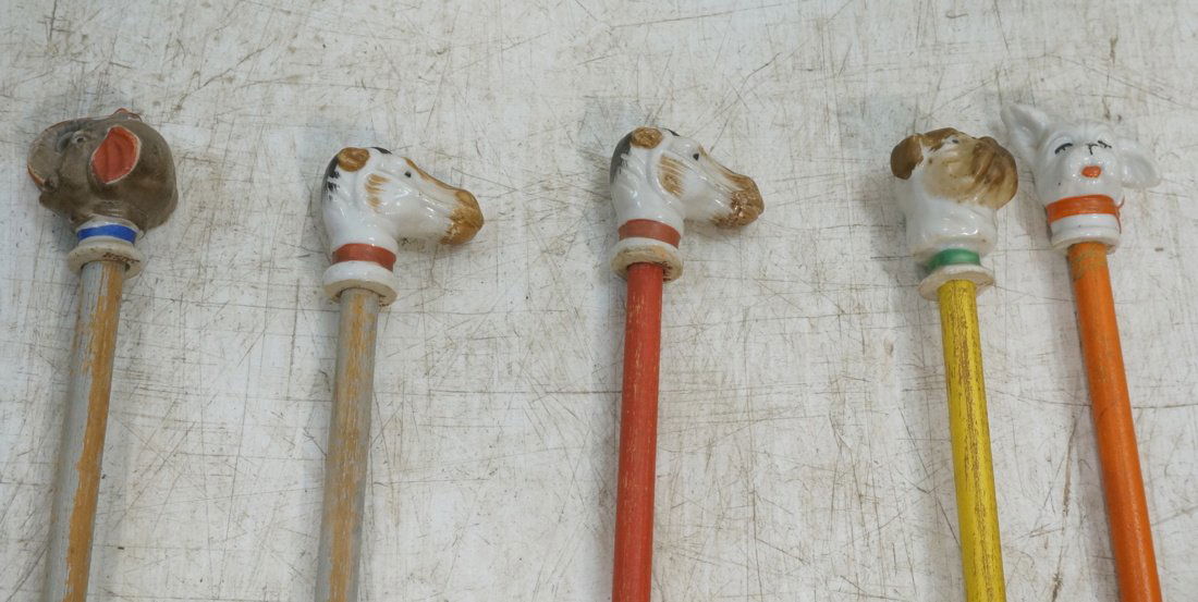 Lot 14 Figural Head Carnival Canes. Eleven with p (1 of 8)