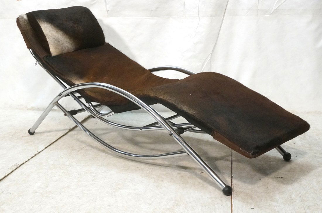 Horse Hide Chrome Chaise Lounge. Thick chrome tub: Horse Hide Chrome Chaise Lounge. Thick chrome tube arched frame. Modernist. Not marked. -- Dimensions: H: 28 inches: W: 72 inches: D: 24 inches ---