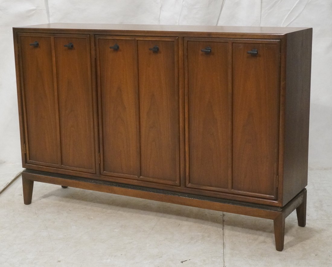 Small Modernist Credenza Sideboard Cabinet on Leg: Small Modernist Credenza Sideboard Cabinet on Legs. Three Door. -- Dimensions: H: 32 inches: W: 49 inches: D: 13.5 inches ---