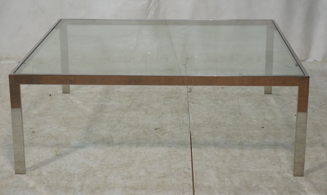 Heavy Modernist Coffee Table. Flat chrome frame c: Heavy Modernist Coffee Table. Flat chrome frame cocktail table with square inset glass.-- Dimensions: H: 15.75 inches: W: 42.25 inches: D: 42.25 inches ---