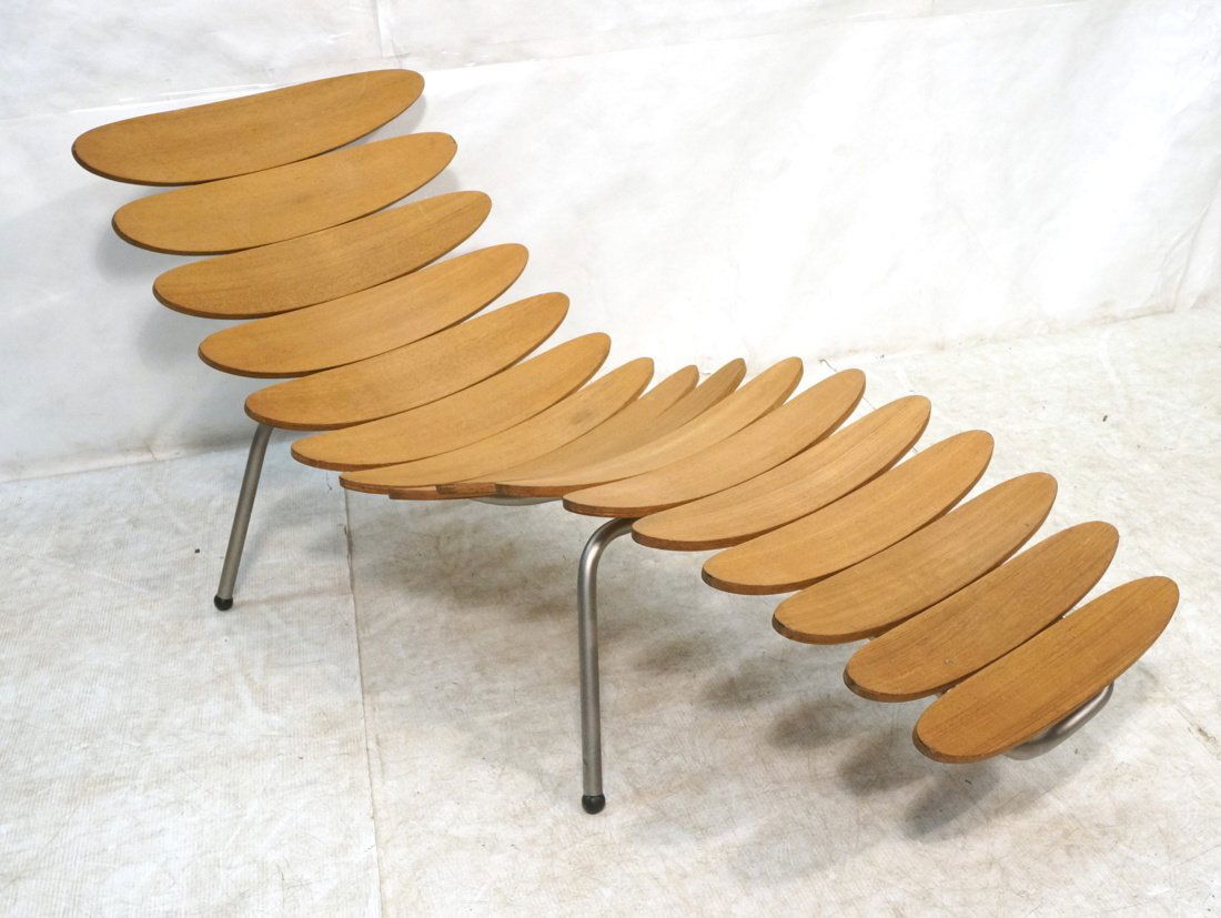 Laminated Wood Chaise Lounge. Corona style. Silve: Laminated Wood Chaise Lounge. Corona style. Silver tube frame base with black ball feet. No marked-- Dimensions: H: 31 inches: W: 73 inches: D: 26 inches ---