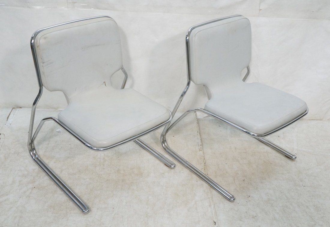 Pr GIO PONTI Chrome Tube Frame Lounge Chairs. Ita: Pr GIO PONTI Chrome Tube Frame Lounge Chairs. Italian. Gray Vinyl Seats. Stacking Nesting Chairs. Marked G Ponti Italia. -- Dimensions: H: 30 inches: W: 19 inches: D: 19.5 inches ---