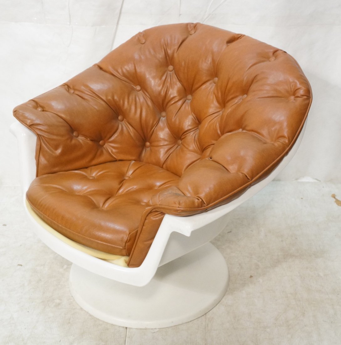 Molded Plastic Modernist Chair. Barrel back. Brow: Molded Plastic Modernist Chair. Barrel back. Brown tufted vinyl seat and back. -- Dimensions: H: 30 inches: W: 34 inches: D: 29 inches ---