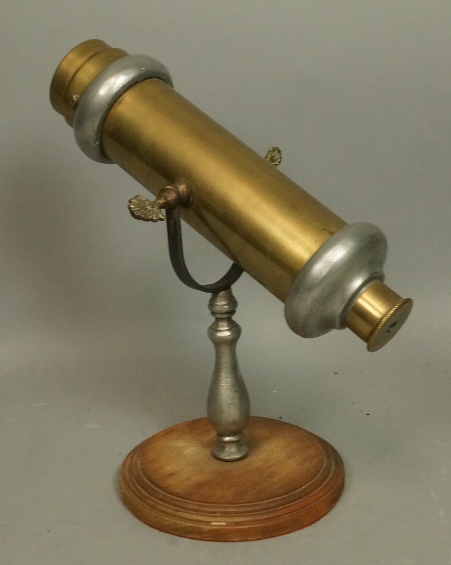 Brass & Iron Kaleidoscope On Wood Base. Stained g: Brass & Iron Kaleidoscope On Wood Base. Stained glass elements. Marked Italy-- Dimensions: H: 12 inches: W: 10.5 inches ---