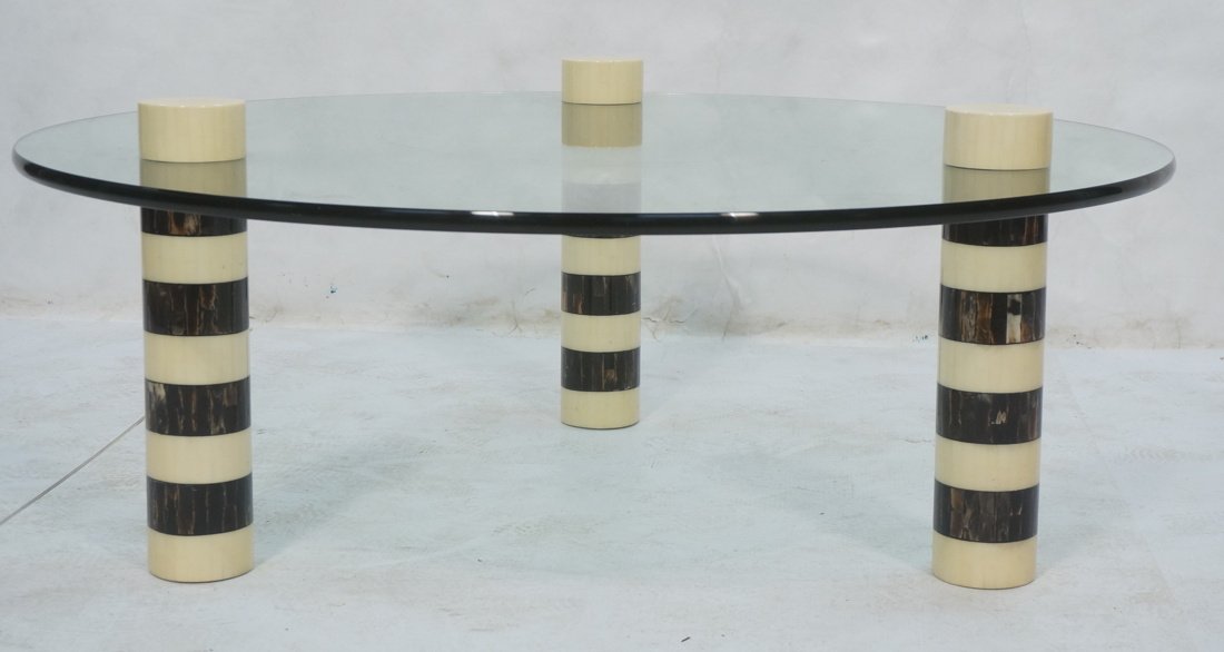 Great Decorator Coffee Cocktails Table. Bone and: Great Decorator Coffee Cocktails Table. Bone and Horn. Three Legged Glass Top Coffee Cocktail Table. Three striped column legs made of tessellated horn & bone bands. 1" thick round glass top.-- Dimens