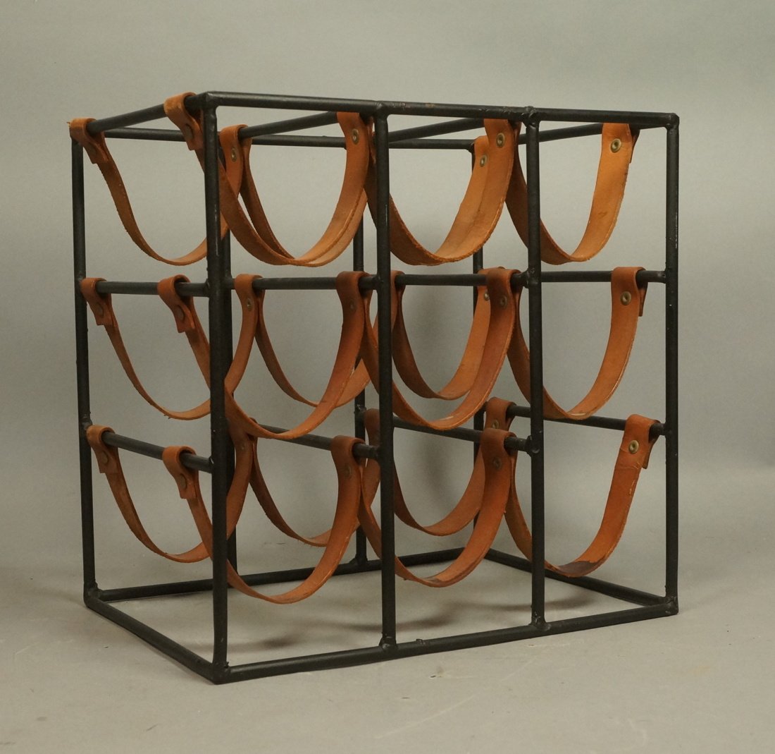 ARTHUR UMANOFF Iron & Leather Wine Rack. Not mark: ARTHUR UMANOFF Iron & Leather Wine Rack. Not marked-- Dimensions: H: 13.5 inches: W: 14 inches: D: 10 inches ---