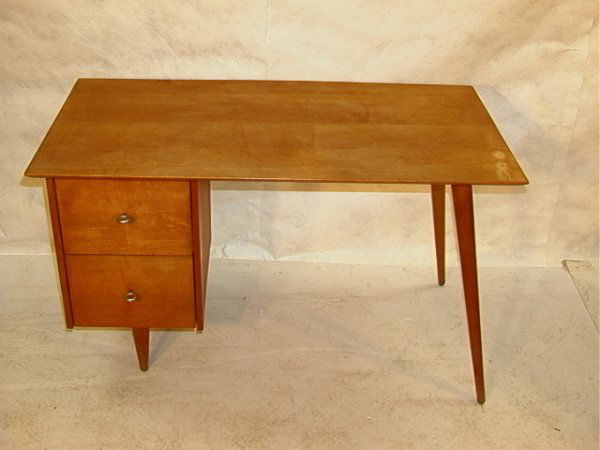PAUL McCOBB PLANNER GROUP 2 Drawer Desk Maple Tape: PAUL McCOBB PLANNER GROUP 2 Drawer Desk Maple Tapered peg legs, aluminum circle drawer pulls. Stamped Paul McCobb Planner Group Dimensions: H: 29 inches: W: 48 inches: D: 24 inches Condition: Top appe