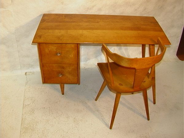 PAUL McCOBB PLANNER GROUP 2 Drawer Desk Chair. Tap: PAUL McCOBB PLANNER GROUP 2 Drawer Desk Chair. Tapered peg leg. Standard McCobb "O" Circle hardware. Desk 29H x 48W x 24D.Chair 31H x 21W x 16.5D Dimensions: Condition: Some overall stains. US Shippin
