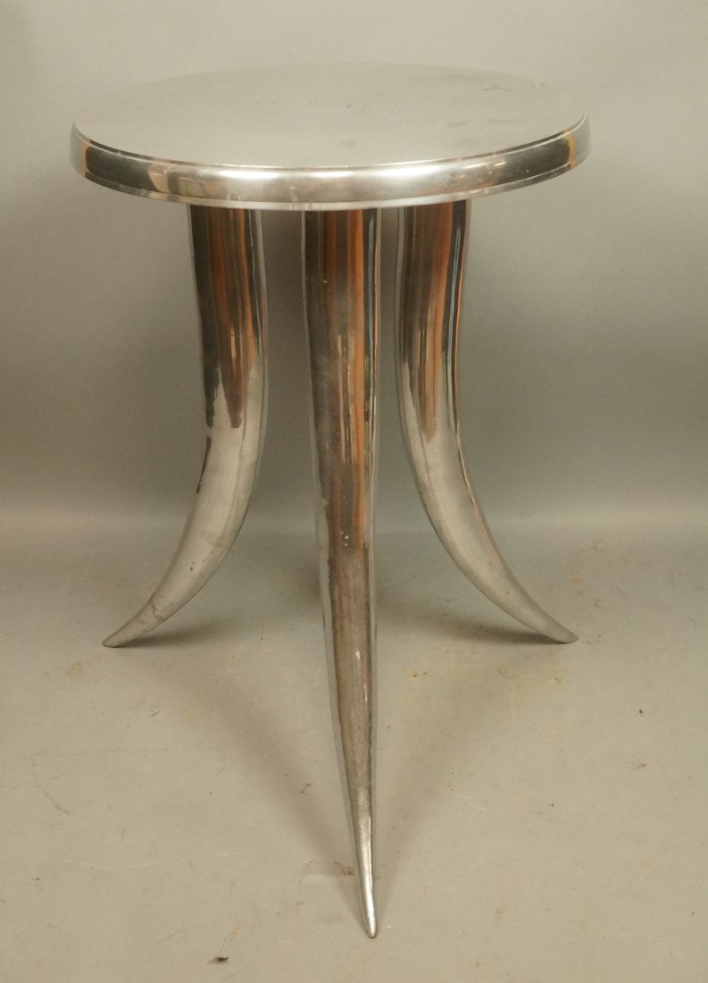 Round small aluminum side table. Three horn form (1 of 6)