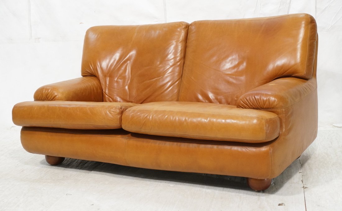Light Brown Leather Love Seat. Lawsonia. Wood Bun (1 of 10)