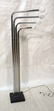 Four arm Chrome Tube Floor Lamp. Black metal base