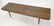 Slat Bench Coffee Table. Dark stained wood. Taper