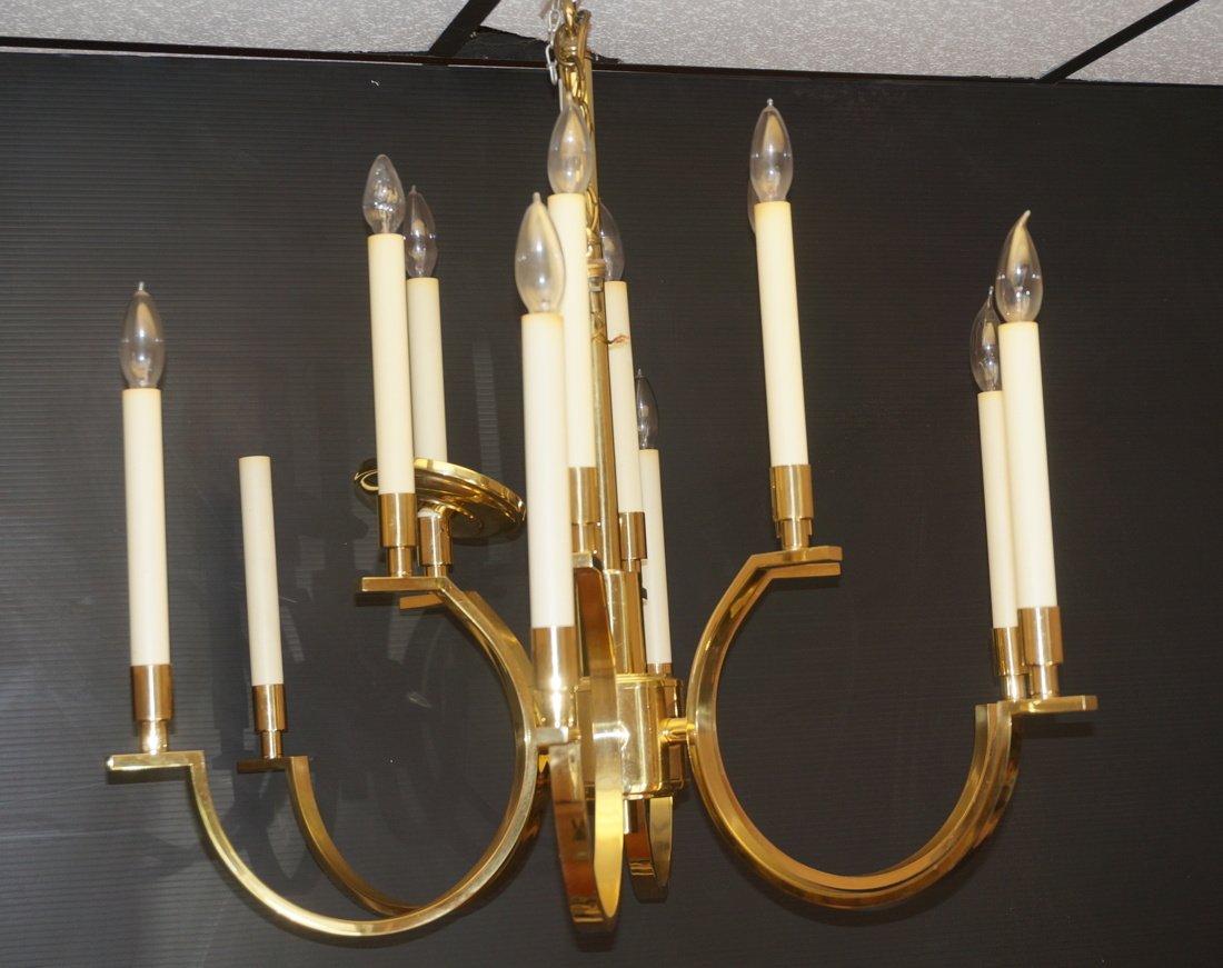 FREDERICK COOPER Modern Brass Chandelier Hanging: FREDERICK COOPER Modern Brass Chandelier Hanging Light. Six Arms with twelve candleholder lights. Shiny Brass finish. -- Dimensions: H: 27 inches: W: 29 inches: D: 29 inches ---