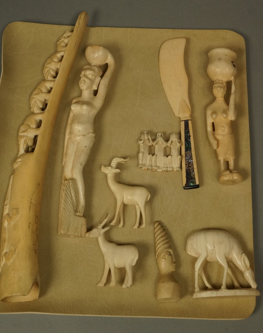 Lot 9 Carved Figural Sculptures. Predominantly Af (1 of 9)