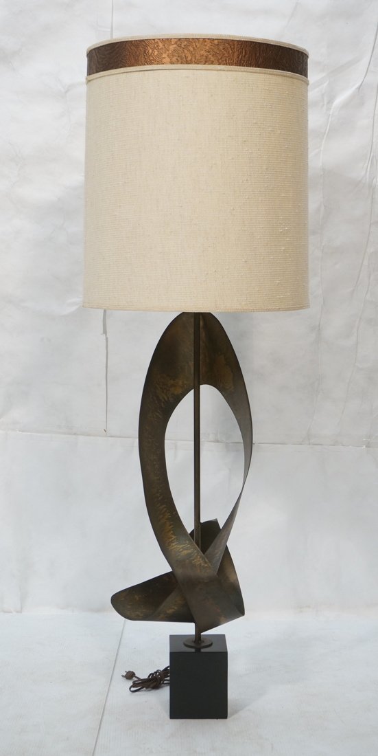 Tall HARRY BALMER Ribbon Form Metal Lamp. Produce: Tall HARRY BALMER Ribbon Form Metal Lamp. Produced by LAUREL. Black metal base. Decorator shade.-- Dimensions: H: 56 inches: W: 20 inches: D: 20 inches ---