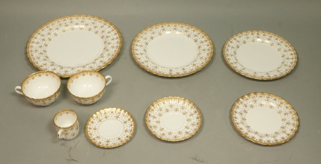 SPODE 47pc Bone China "Fleur de Lis" Dinnerware.: SPODE 47pc Bone China "Fleur de Lis" Dinnerware. Plates. Scalloped border edge on white china with gold rim and fleur de lis designs. Service for 7 but only two lunch plates. -- Dimensions: H: 10.5 in