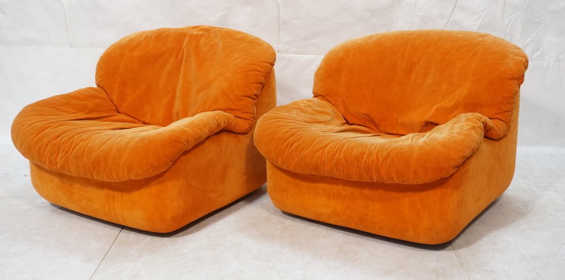 Pr Orange Plush Lounge Chairs. Swivel. Pillow for: Pr Orange Plush Lounge Chairs. Swivel. Pillow form top on square fabric base. -- Dimensions: H: 27.5 inches: W: 33 inches: D: 36 inches ---