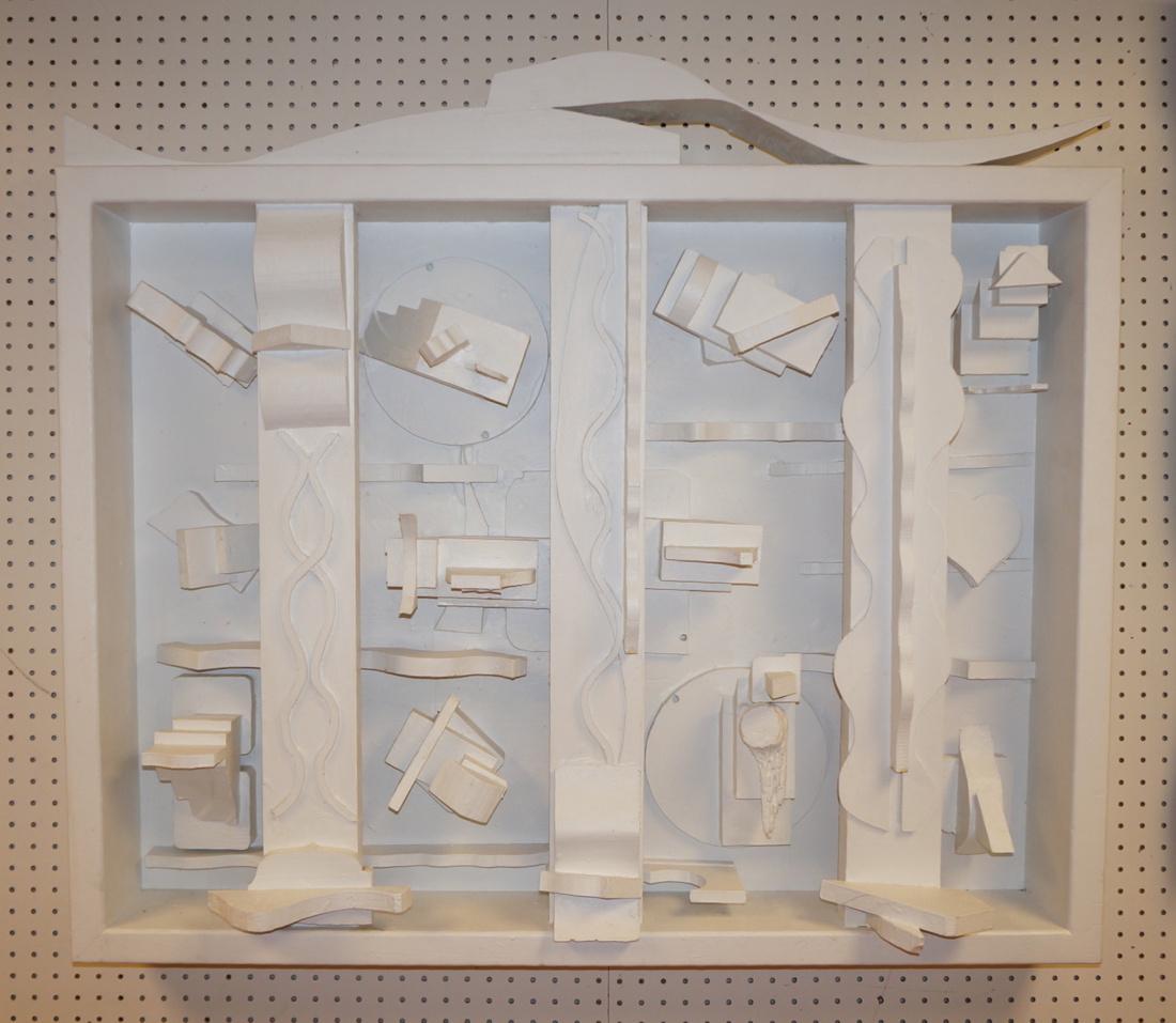 FLORENCE PUTTERMAN Wood Assemblage Wall Hanging.: FLORENCE PUTTERMAN Wood Assemblage Wall Hanging. Shadowbox frame with sculptural 3D wood elements. Painted white. Titled Ala Nevelson. 1970-- Dimensions: H: 37 inches: W: 43 inches: D: 9 inches ---