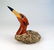 Folk Art Waterfowl A wooden and stone sculpture of a