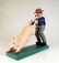 Folk Art Man Smoking Pipe Holding Pig A wooden carving