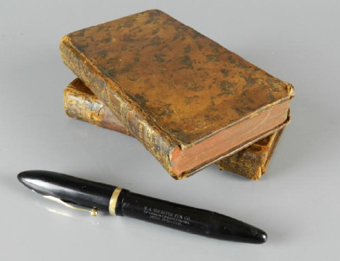 Rare Antique Books Approved By French King D. 1761: Two rare books, "Le TraitÃ© du Vrai MÃ©rite de l'Homme", New Edition Tome II, by M. Le Maitre de Claville with approbation and privilege of the King, condition noted: leather bound in very good co