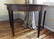 PAIR OF GEORGIAN PERIOD DEMI-LUNE TABLES