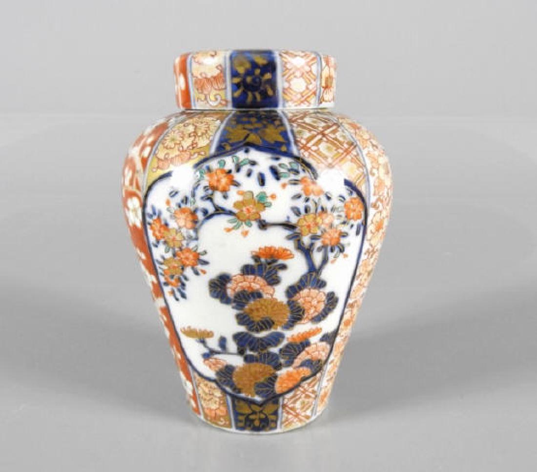 JAPANESE MEIJI PERIOD GINGER JAR: A Japanese Meiji period Imari pattern ginger jar, decorated with a blossoming tree motif, circa 1890, 6 1/4 inches tall.