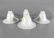FOUR WHITE ART GLASS SHADES