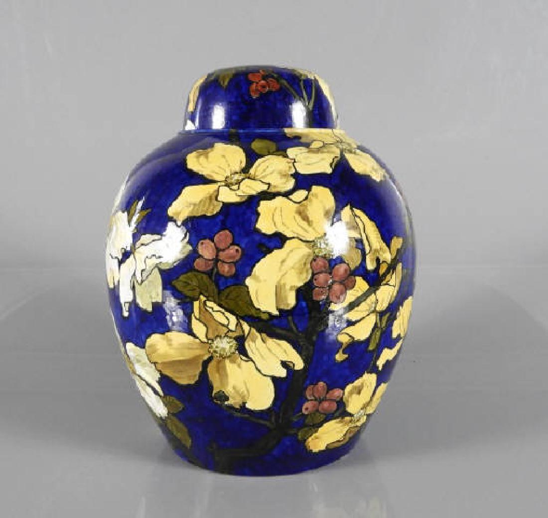 ART - John BENNETT (1840-1907, British, American): John Bennett, large and important lidded art pottery jar, decorated with dogwood blossoms on a blue ground, marked on bottom "Bennett 412E24, New York, 1881", 15" x 12", condition: mint. His work is i