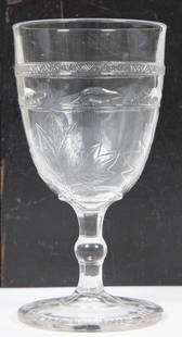 BEAVER BAND GOBLET / VERRE AVEC CASTORS, D. 1880: A “beaver band” pressed glass goblet made in Quebec for the Société Saint Jean Baptiste, dated "24 juin 1880, Excelsior Glass Company" (formerly St Johns glassware). H: 5