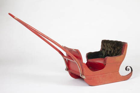 TOY RED SLEIGH / TRAÎNEAU-JOUET ROUGE, CIRCA 1890: A red painted model of a sleigh used as a child's toy. Quebec, circa 1890. H: 9"; W: 14"; D: 8". // Modèle de traîneau peint en rouge, utilisé comme jouet pour enfant. Québec.