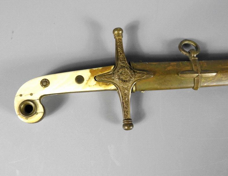 ANTIQUE MAMELUKE-HILTED SABRE: An 1831 pattern General officer's mameluke-hilted sabre, by E. THURKLE maker, Soho, London, slightly curved bright blade, etched over half its length on both sides with scrolls, crossed branches of la