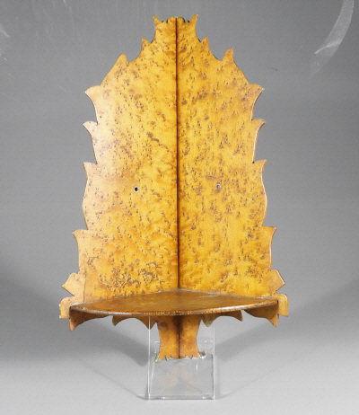 BURLED WOOD CORNER SHELF: A mid 19th century burled wood corner shelf. Condition noted, split on one corner. Dimensions, 18.5" x 7.5".