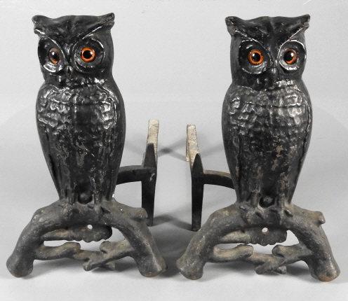PAIR OF CAST IRON OWL ANDIRONS: A good pair of cast iron andirons in the form of owls. Original orange / black eyes and black paint to body. Excellent condition. Circa 1880. Dimensions, 14.5" x 9.25" x 19.5".