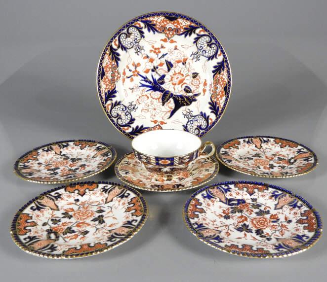 ROYAL CROWN DERBY TABLEWARE & MINTONS: Five Royal Crown Derby pattern no. 2224 Black, Starr Frost dessert plates along with a Royal Crown Derby "M” Imari luncheon plate (diameter, 9") and Mintons.