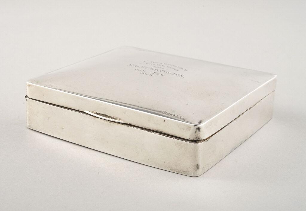 SMALL HALLMARKED SILVER HUMIDOR / CIGARETTE BOX, 1919: A small hallmarked humidor - cigarette box, cedar lined, inscribed "To the Commander...1920". Marks for Birmingham, 1919. Dimensions, 1.5 x 5.75 x 5.25. Total weight, 520 grams.