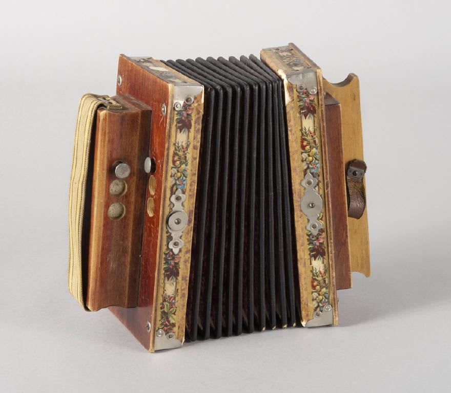 SMALL EUROPEAN FOLK ACCORDION: A Swiss or Austrian small folk accordion, intact bellows with a nice sound. Dimensions, 9.75" x 8.25" x 5".