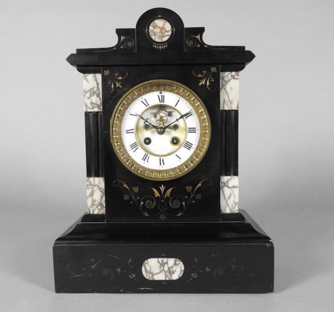 LATE 19TH CENTURY FRENCH MARBLE MANTLE CLOCK: A late 19th century French marble mantle clock, the case showing an architectural cornice, decorated with gilt incised detail and grey marble panels, the white enamel chapter ring with black Roman num