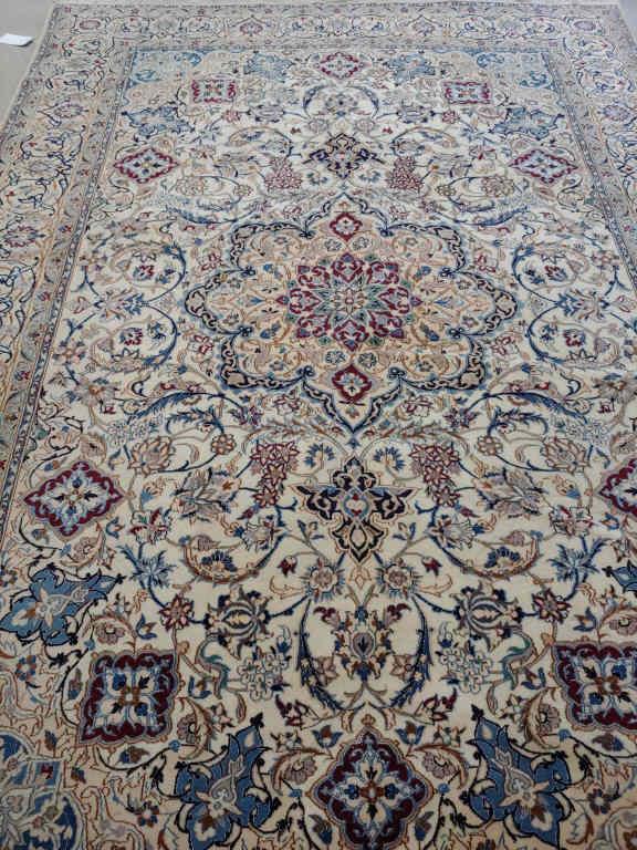 PERSIAN NAIN RUG: A Persian Nain rug, wool on cotton, silk inlets, good condition, coarse weave, few small red dye running spots. Dimensions, 6'10" x 10'3".