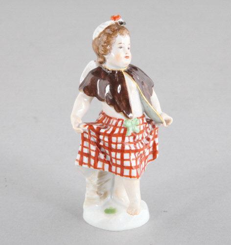 MEISSEN PORCELAIN FIGURINE: A small Meissen porcelain figurine of a young girl. Marked to base. Dimensions, 3.5" h x 1.5" diameter.