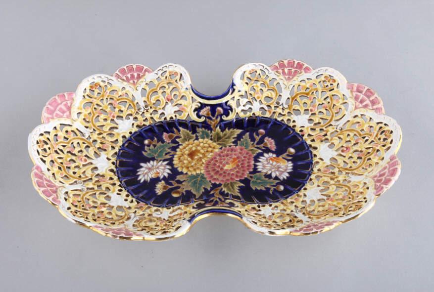 ZSOLNAY TABLE CENTREPIECE: A Zsolnay Hungary table centrepiece, with pierced border and hand painted chrysanthemum medallion. Marked to base. Dimensions, 2.5" h x 16.75" w x 10.25" d.