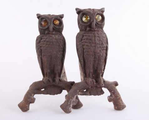 Pair of Andirons, Owl Motif, Circa 1890: A pair of owl fireplace andirons with glass marble eyes. Circa 1890. H: 13"; W: 8"; D: 15".
